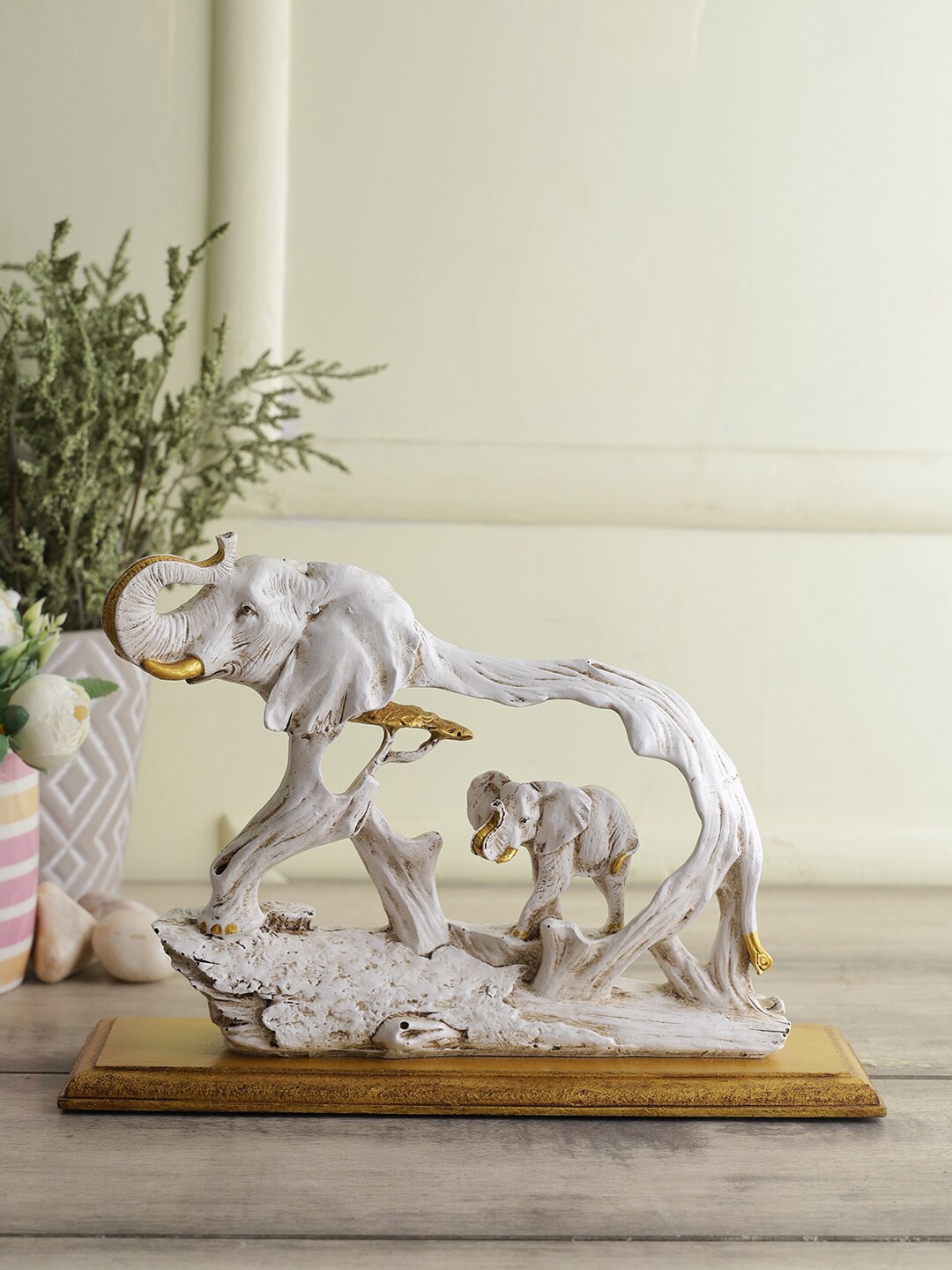 

CraftVatika Grey & Brown Solid Polyresin Feng Sui Vastu Elephant Showpiece