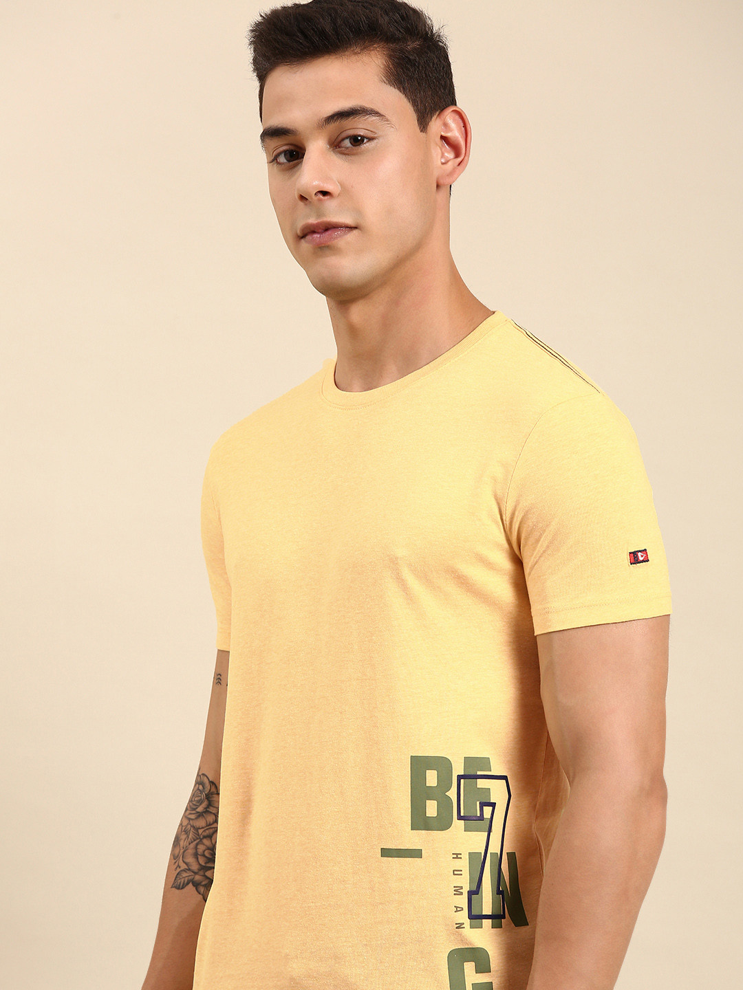 

Being Human Men Light Yellow Brand Logo Printed Pure Cotton T-shirt