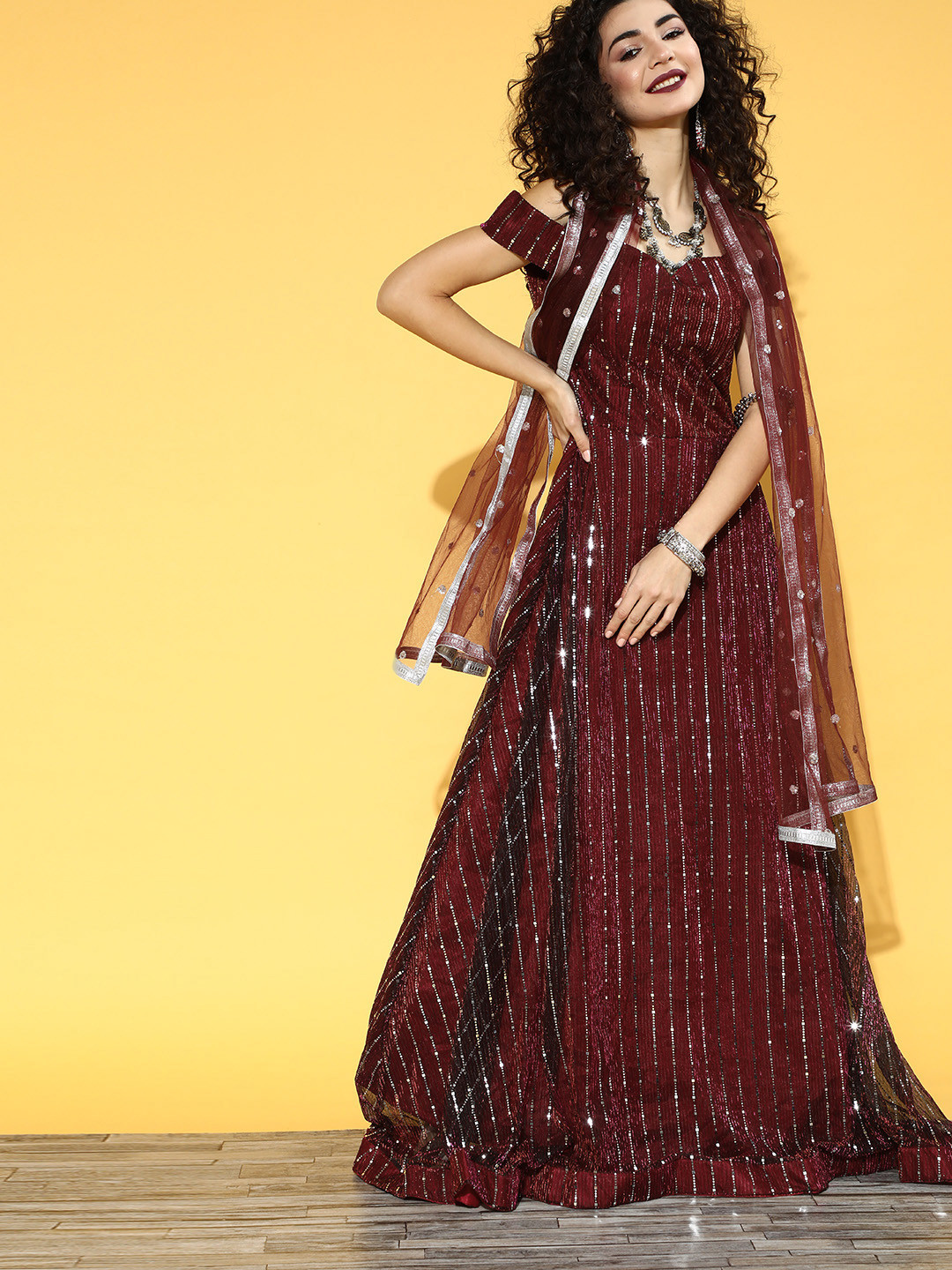 

Chhabra 555 Women Maroon Striped Gown for Days