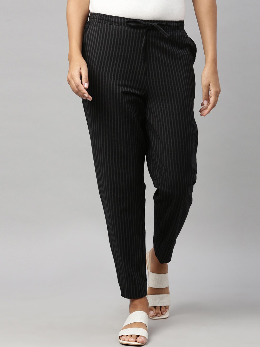 

Go Colors Women Black Striped Linen Mid Rise Trousers