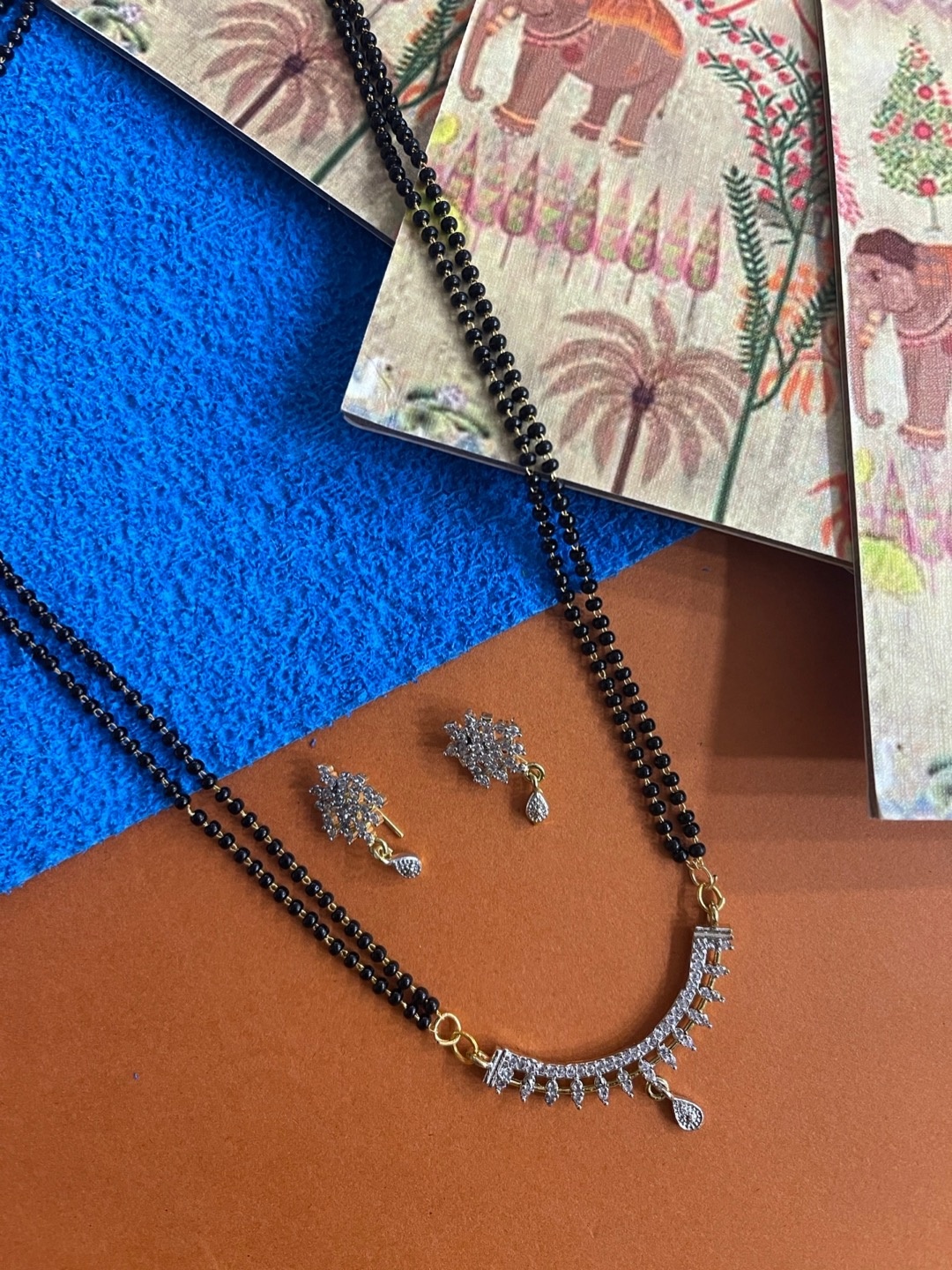 

Digital Dress Room Women Gold-Plated White & Black Stone-Studded Mangalsutra Set