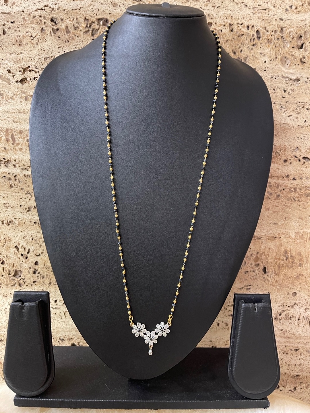 

Digital Dress Room Gold-Plated & Black Beaded Stone-Studded Mangalsutra