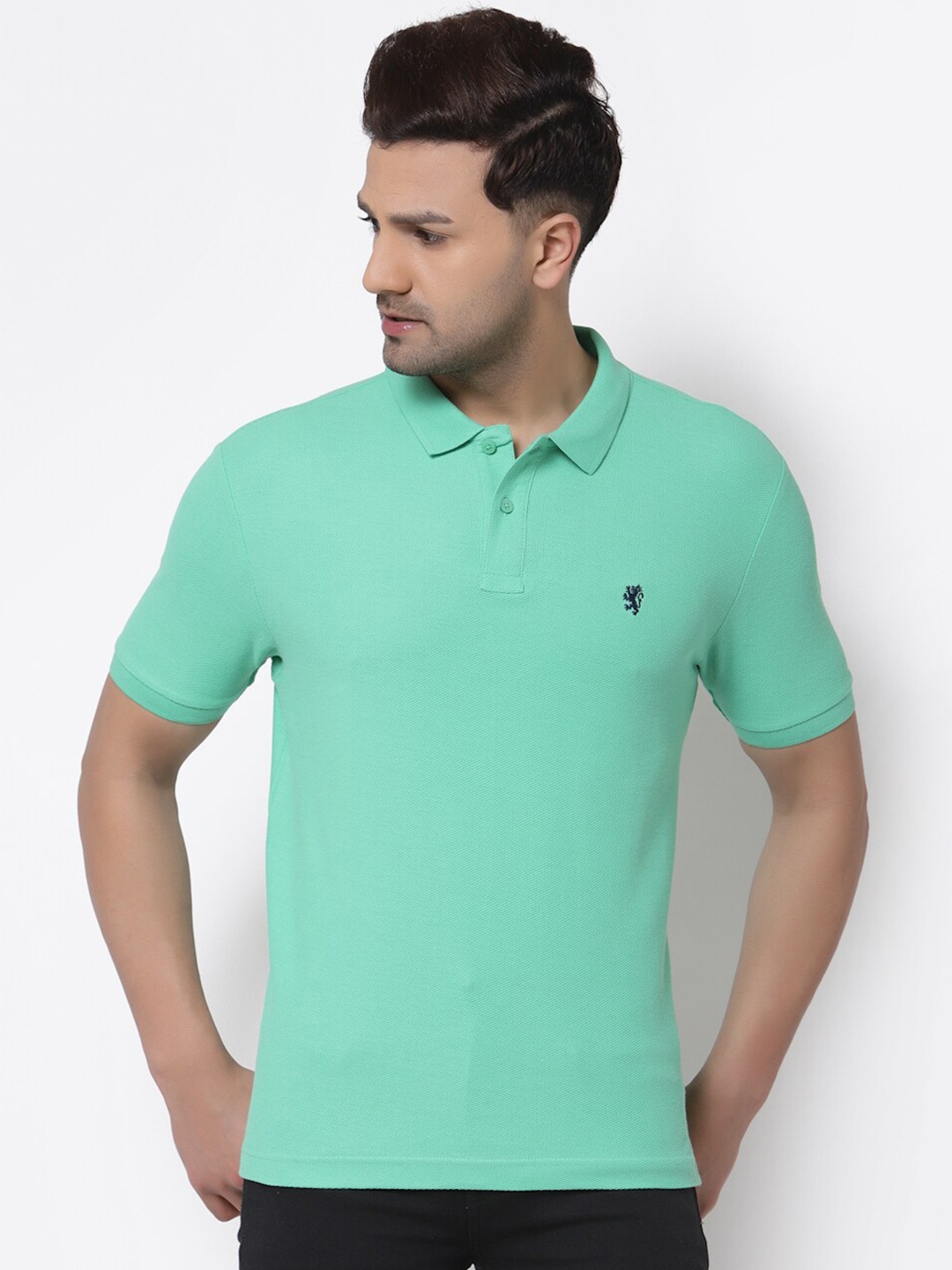 

Red Tape Men Green Solid Polo Collar T-shirt