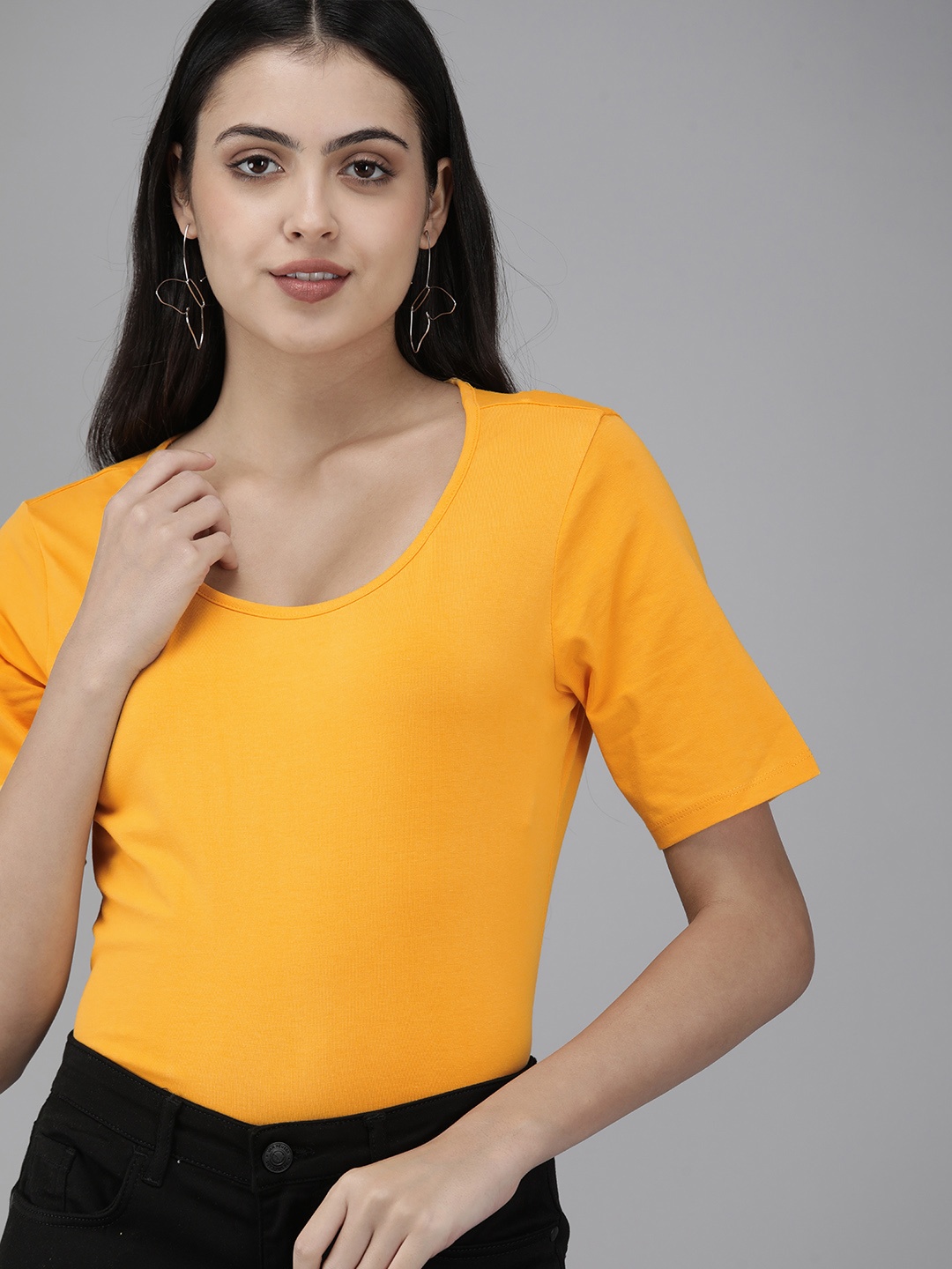 

Van Heusen Woman Yellow Solid T-shirt