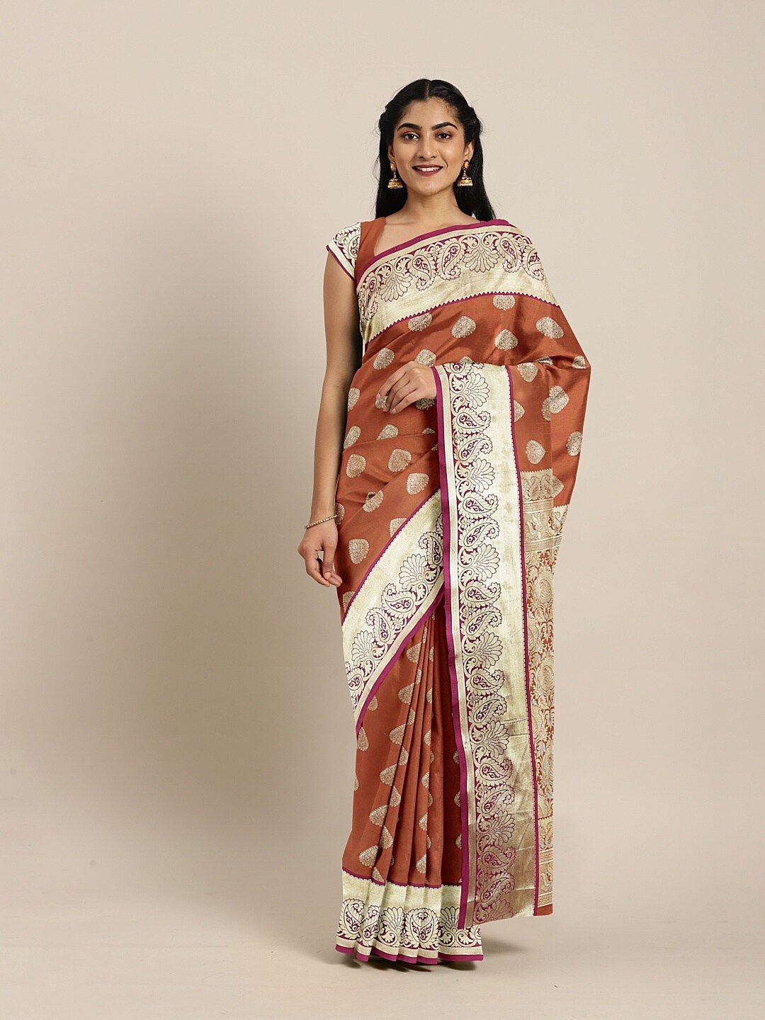 

The Chennai Silks Coral & Silver-Toned Ethnic Motifs Zari Art Silk Saree