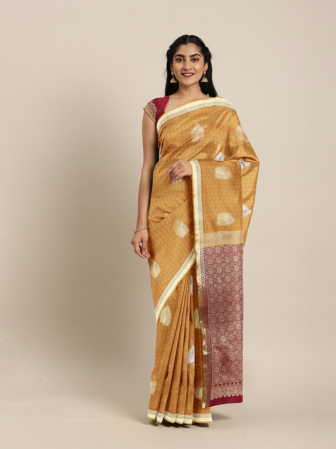 

The Chennai Silks Mustard & Silver-Toned Ethnic Motifs Zari Art Silk Fusion Saree