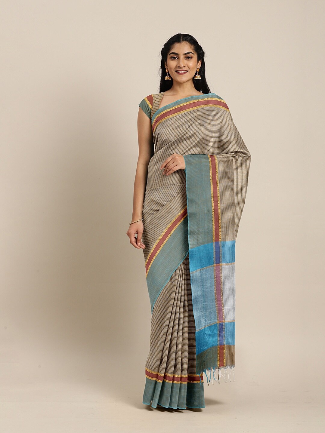 

The Chennai Silks Brown & Blue Checked Zari Pure Cotton Saree