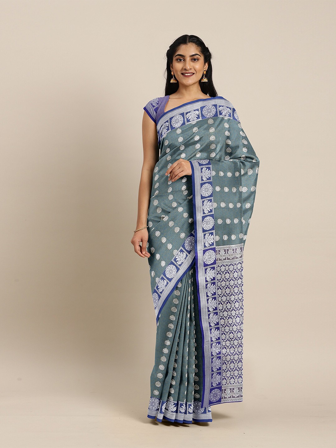 

The Chennai Silks Green & Blue Ethnic Motifs Zari Art Silk Saree