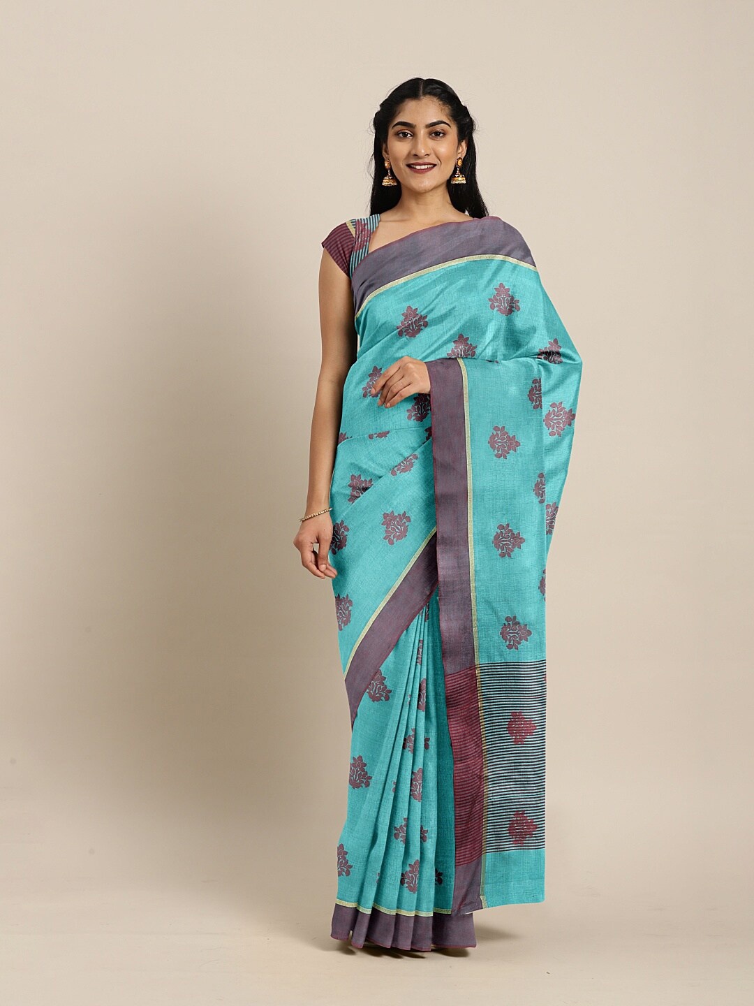 

The Chennai Silks Teal & Burgundy Ethnic Motifs Zari Jute Cotton Saree