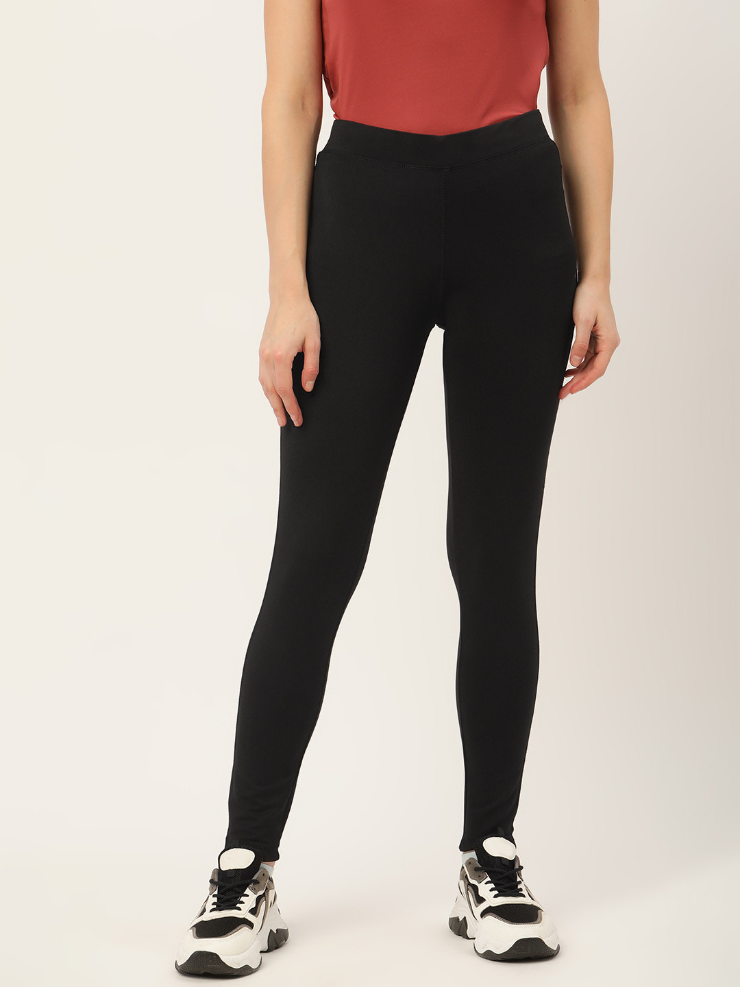 

Madame Women Black Solid Track Pants