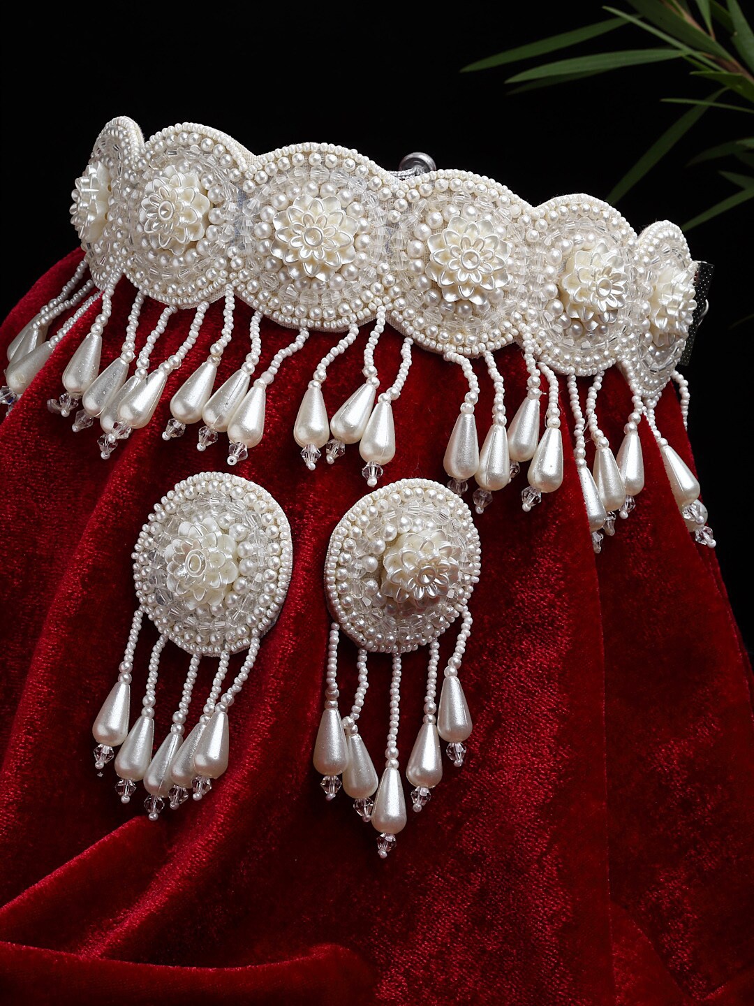 

Sargi Off White Moedbuille Crystals & Pearls Studded Floral Tasselled Design Handcrafted Contemporary Jewellery Set