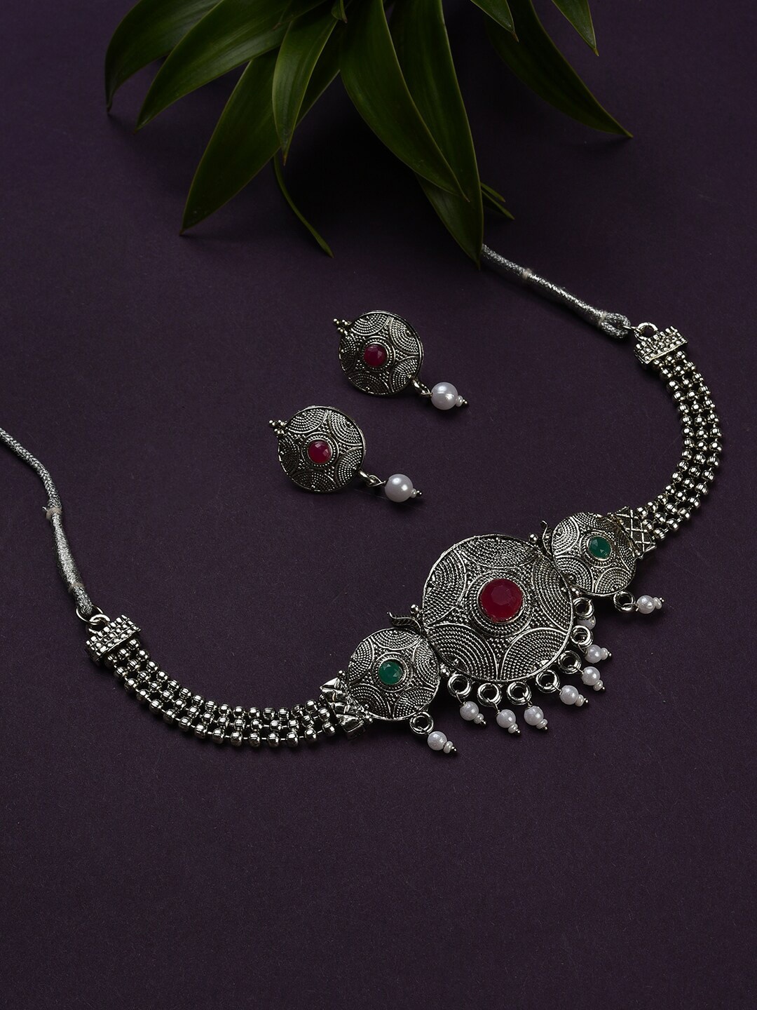

SOHI Oxidized Silver-Plated Magenta & Green Stone Studded Jewellery Set