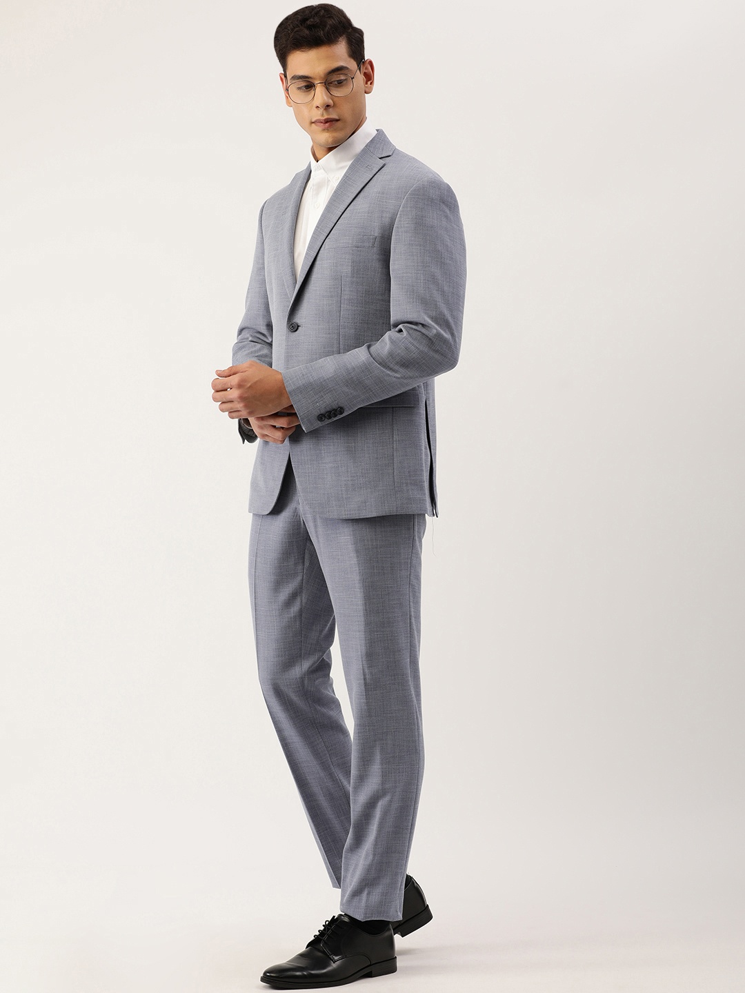 

Peter England Men Blue Solid Two-Piece Formal Suit