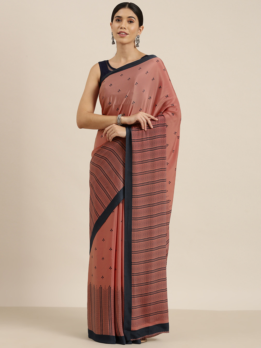 

Sangria Pink Ethnic Motifs Pure Crepe Saree