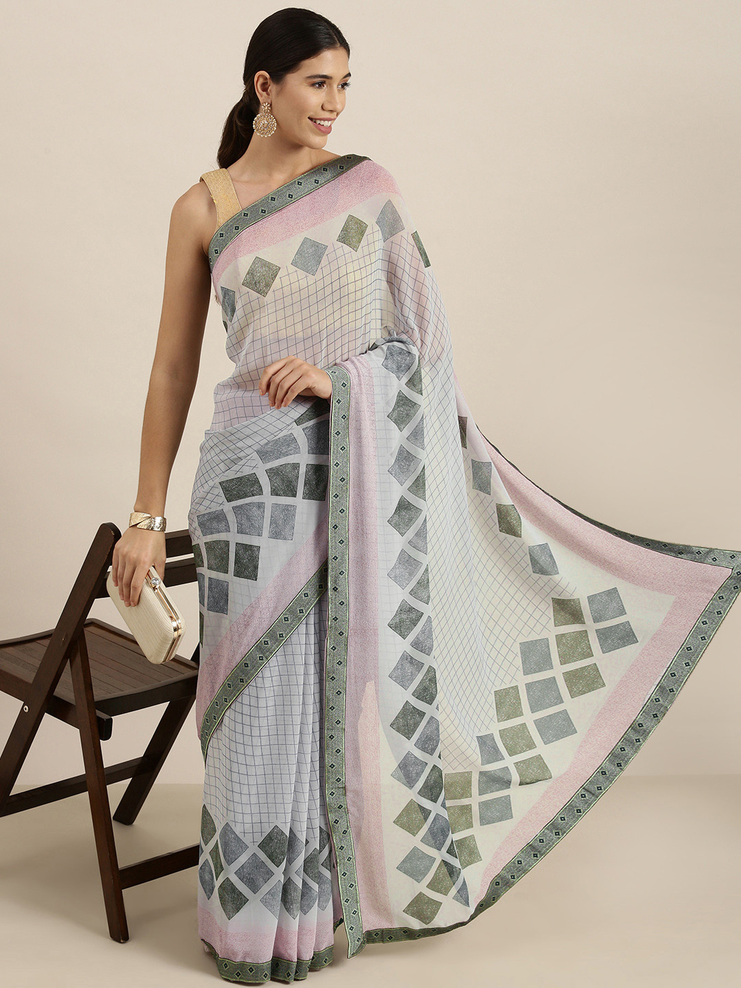 

Sangria Blue Checked Pure Georgette Saree