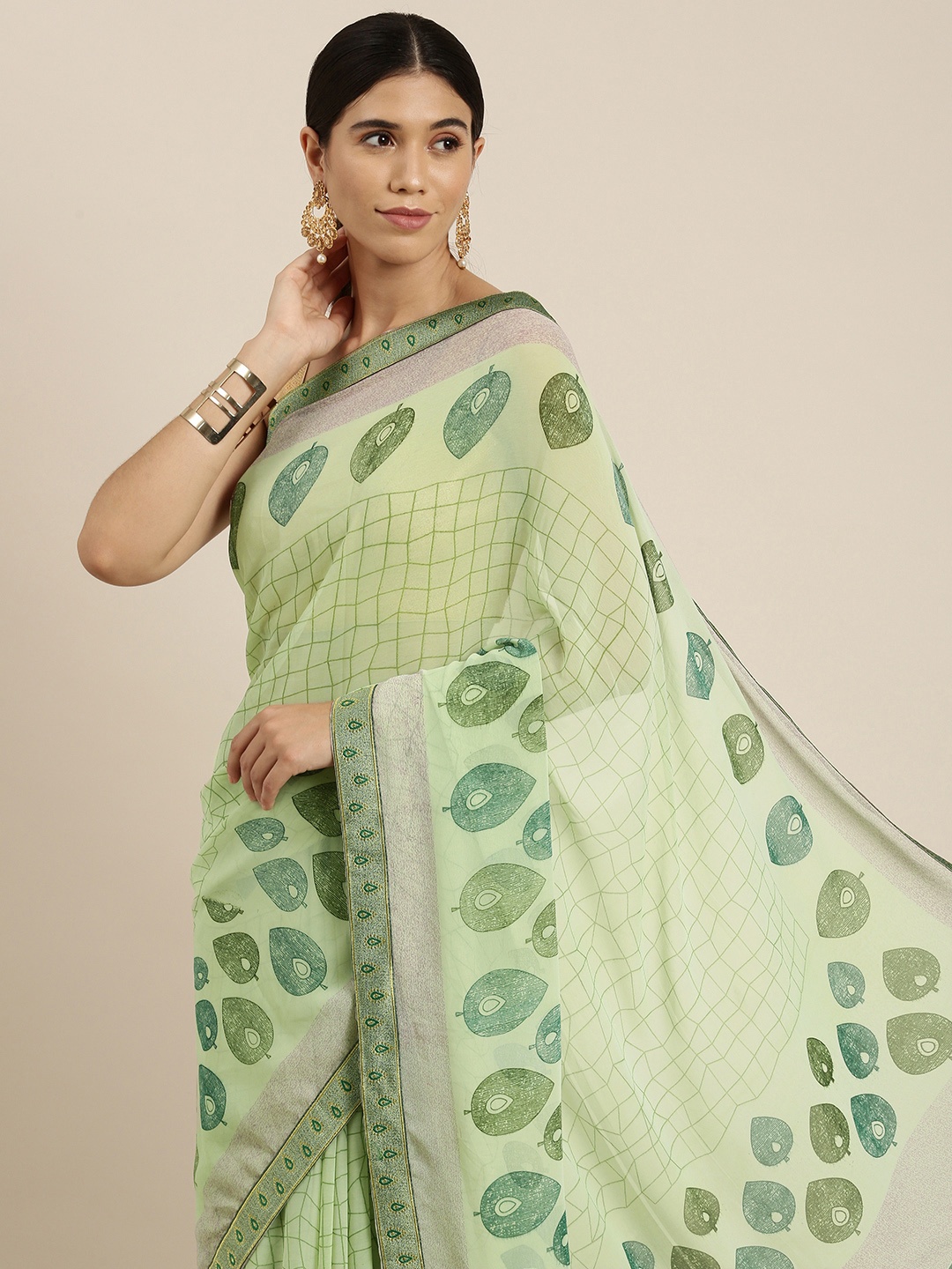 

Sangria Green Ethnic Motifs Pure Georgette Saree