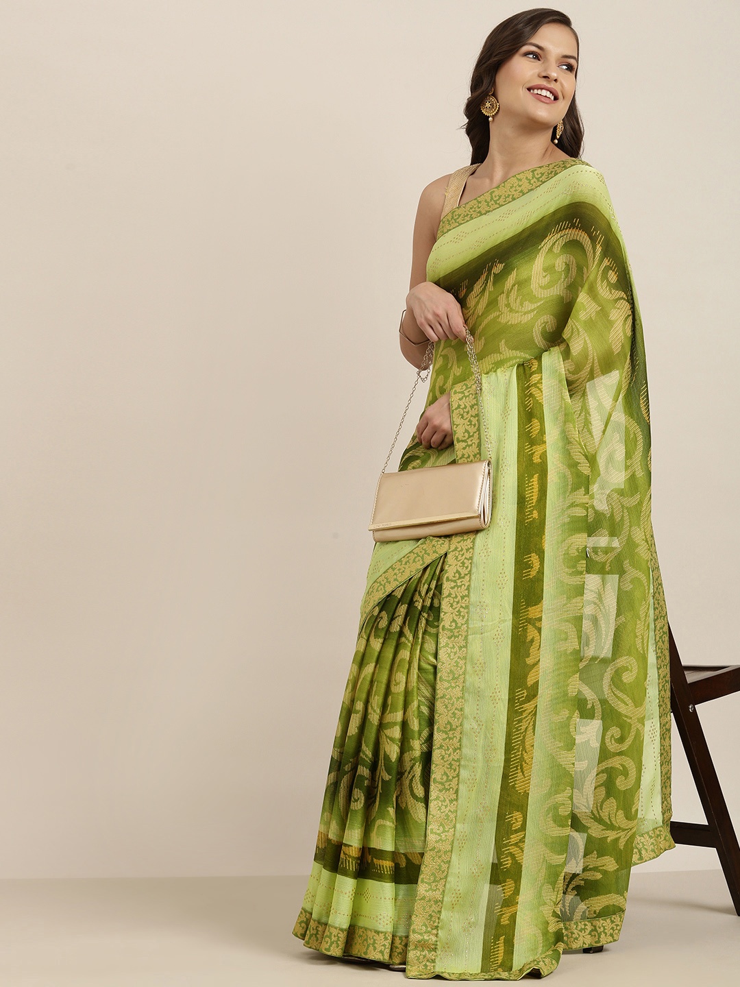 

Sangria Olive Green & Cream-Coloured Ethnic Motifs Beads and Stones Pure Chiffon Saree