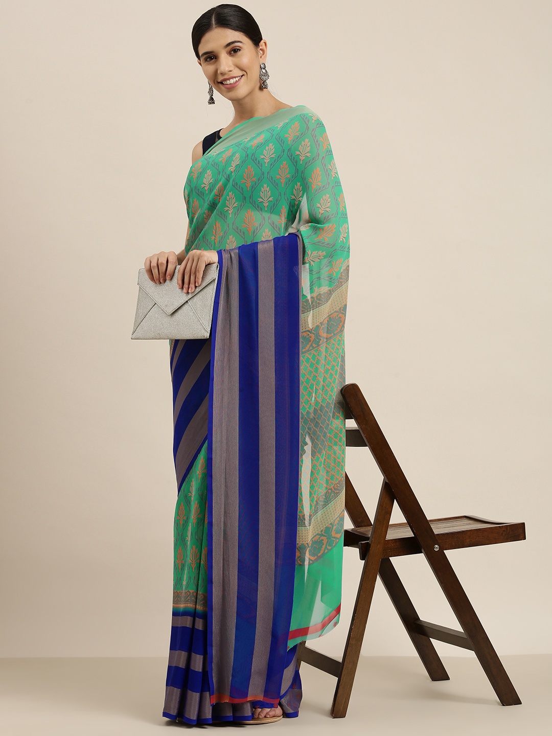 

Sangria Turquoise Blue Ethnic Motifs Pure Georgette Saree