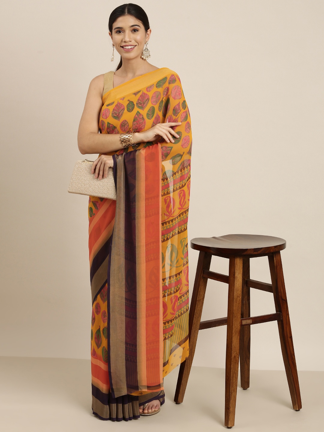 

Sangria Mustard & Orange Ethnic Motifs Pure Georgette Saree