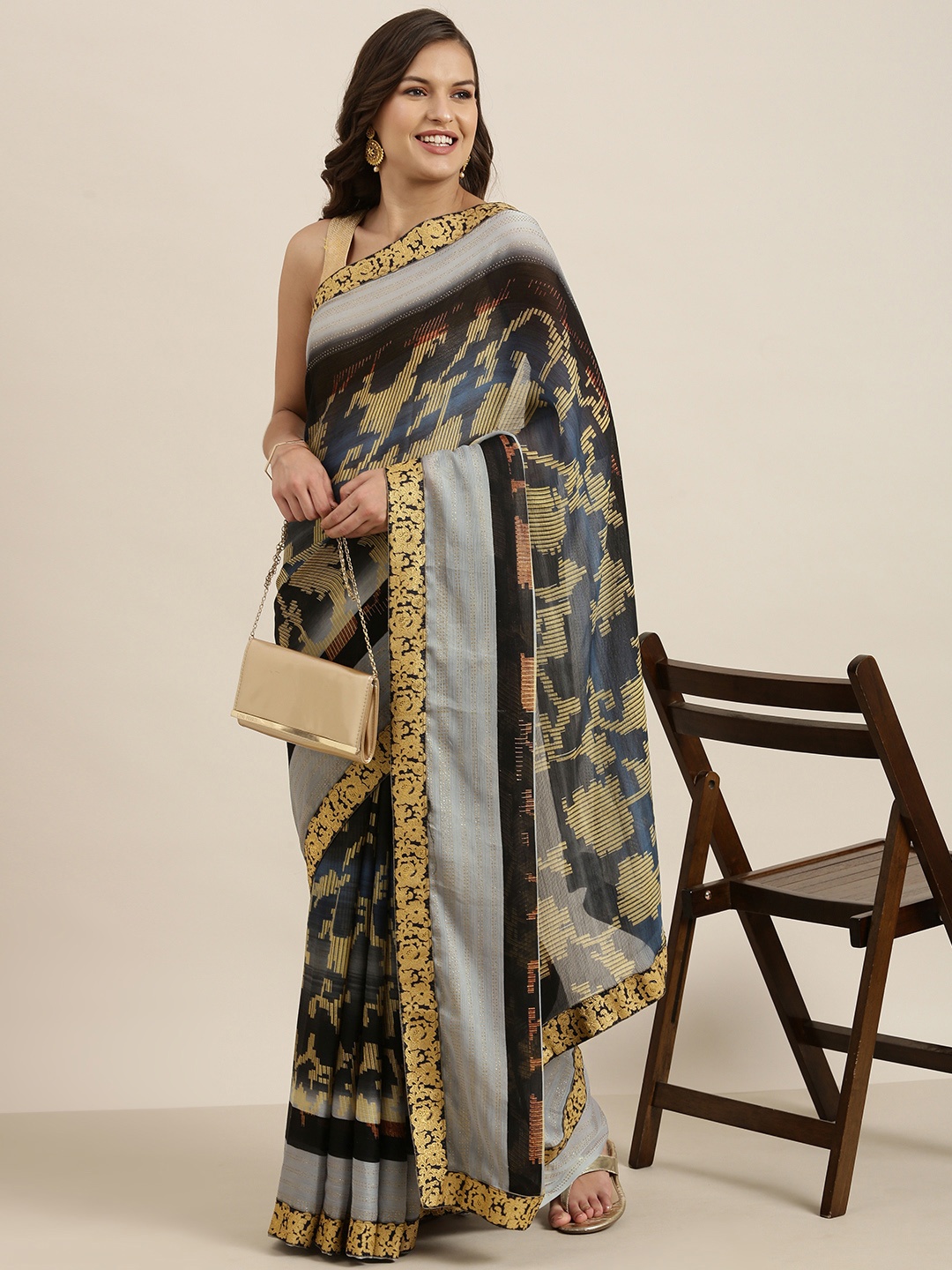 

Sangria Black & Navy Blue Ethnic Motifs Beads and Stones Pure Chiffon Saree
