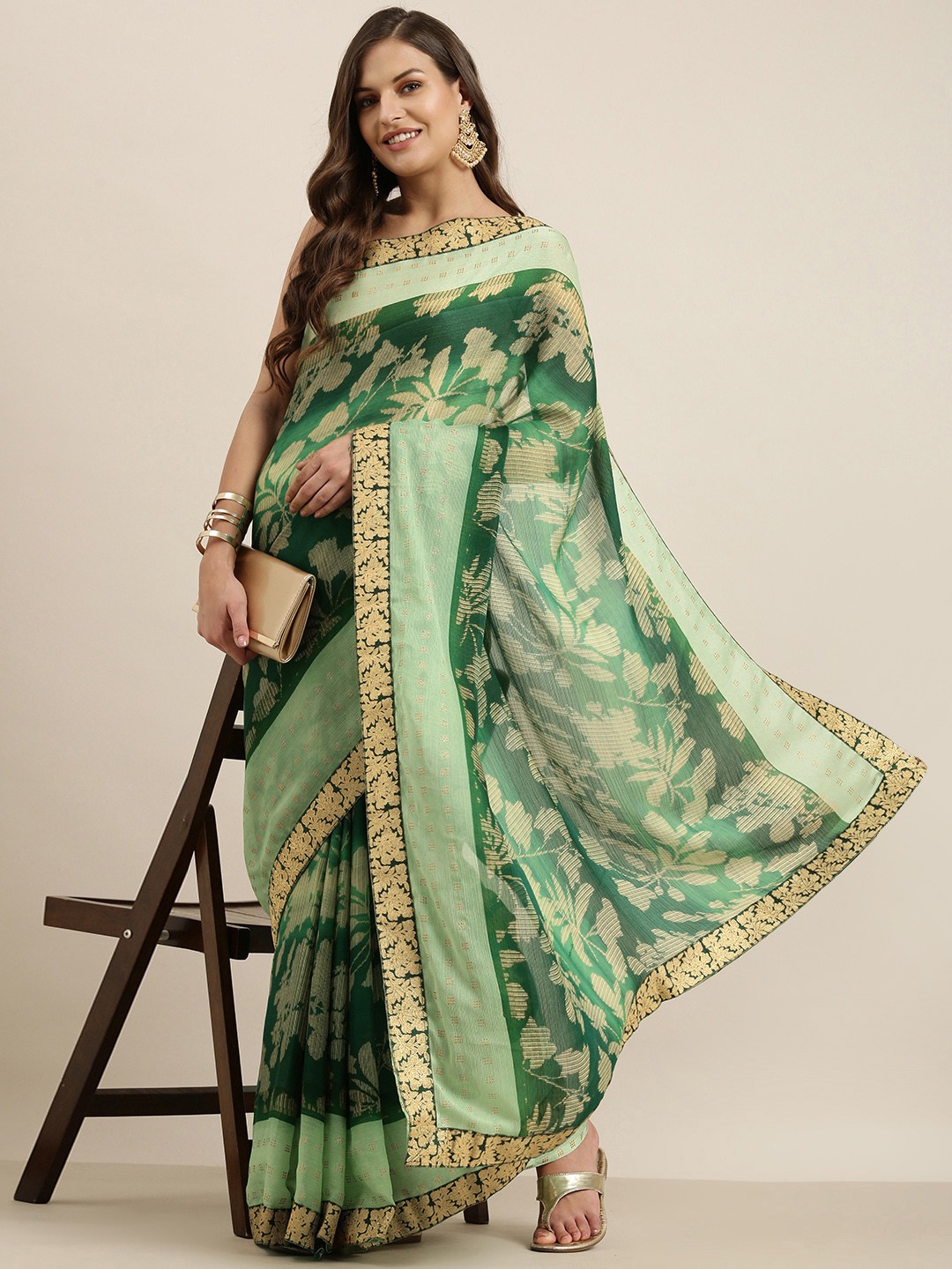 

Sangria Green & Beige Ethnic Motifs Beads and Stones Pure Chiffon Saree