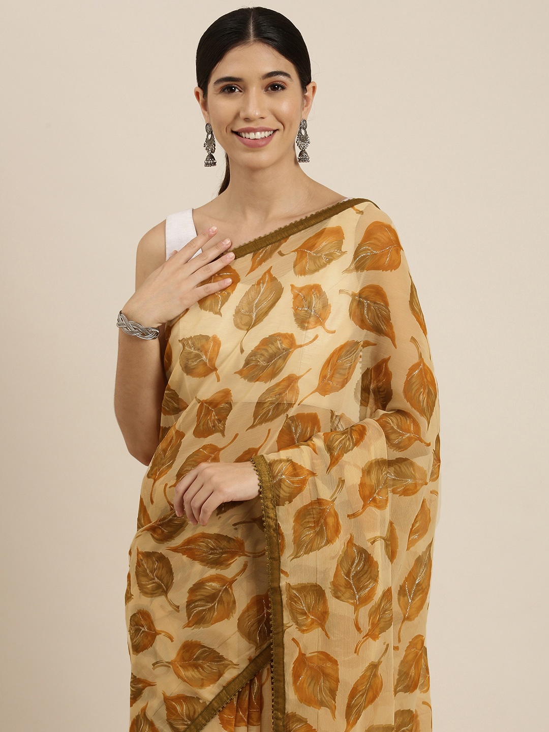 

Sangria Beige Ethnic Motifs Pure Chiffon Saree