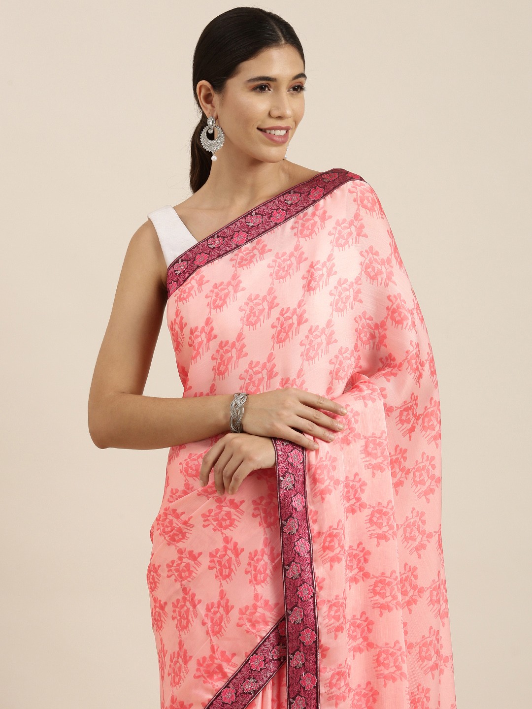 

Sangria Pink Ethnic Motifs Pure Georgette Saree