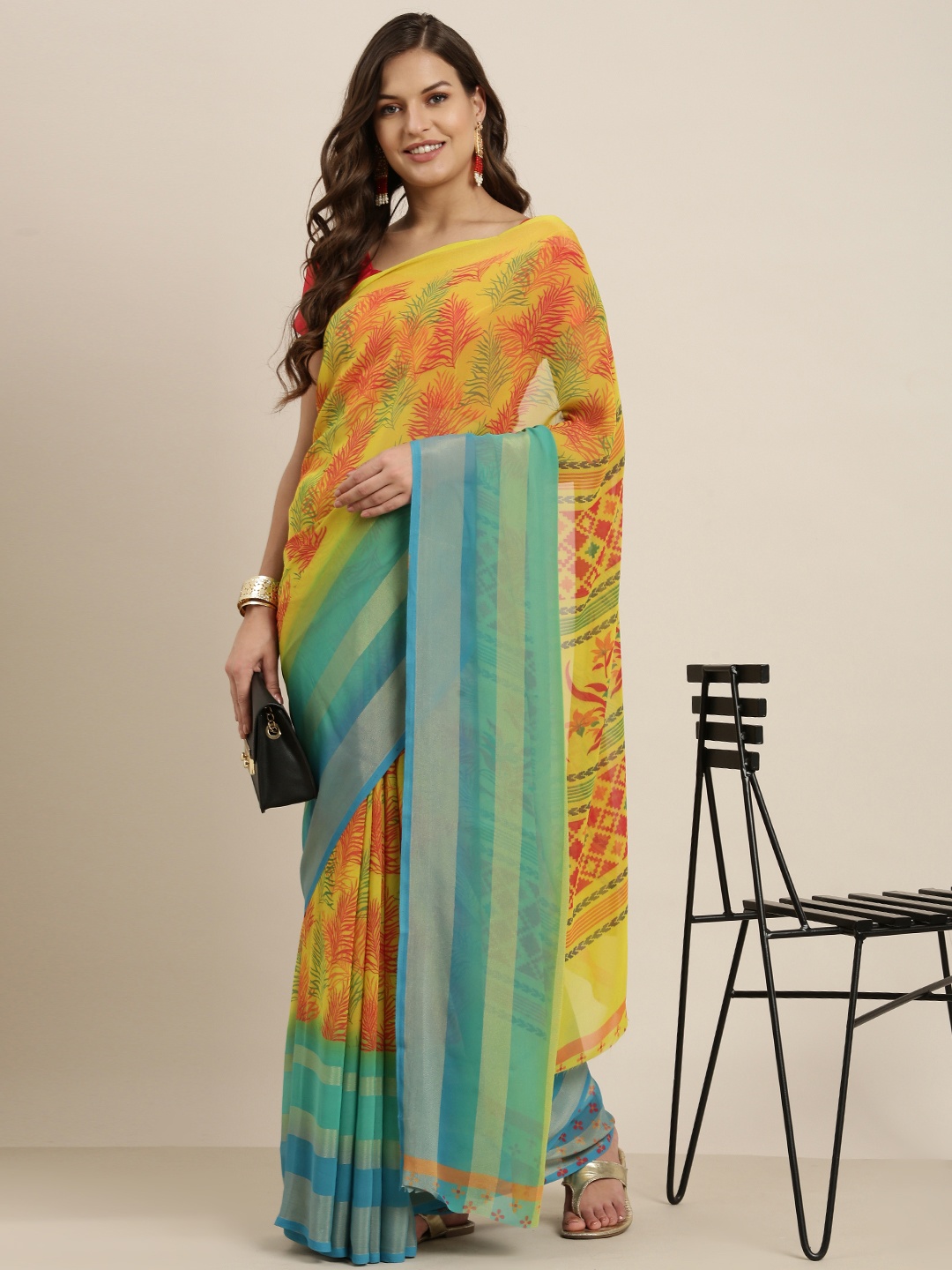 

Sangria Yellow & Turquoise Blue Pure Georgette Saree