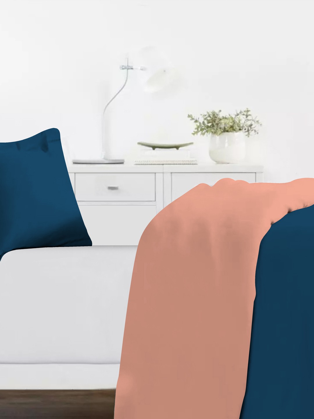 

Divine Casa Navy Blue & Peach Solid 150 TC Single Duvet Cover With 2 Pillow Covers