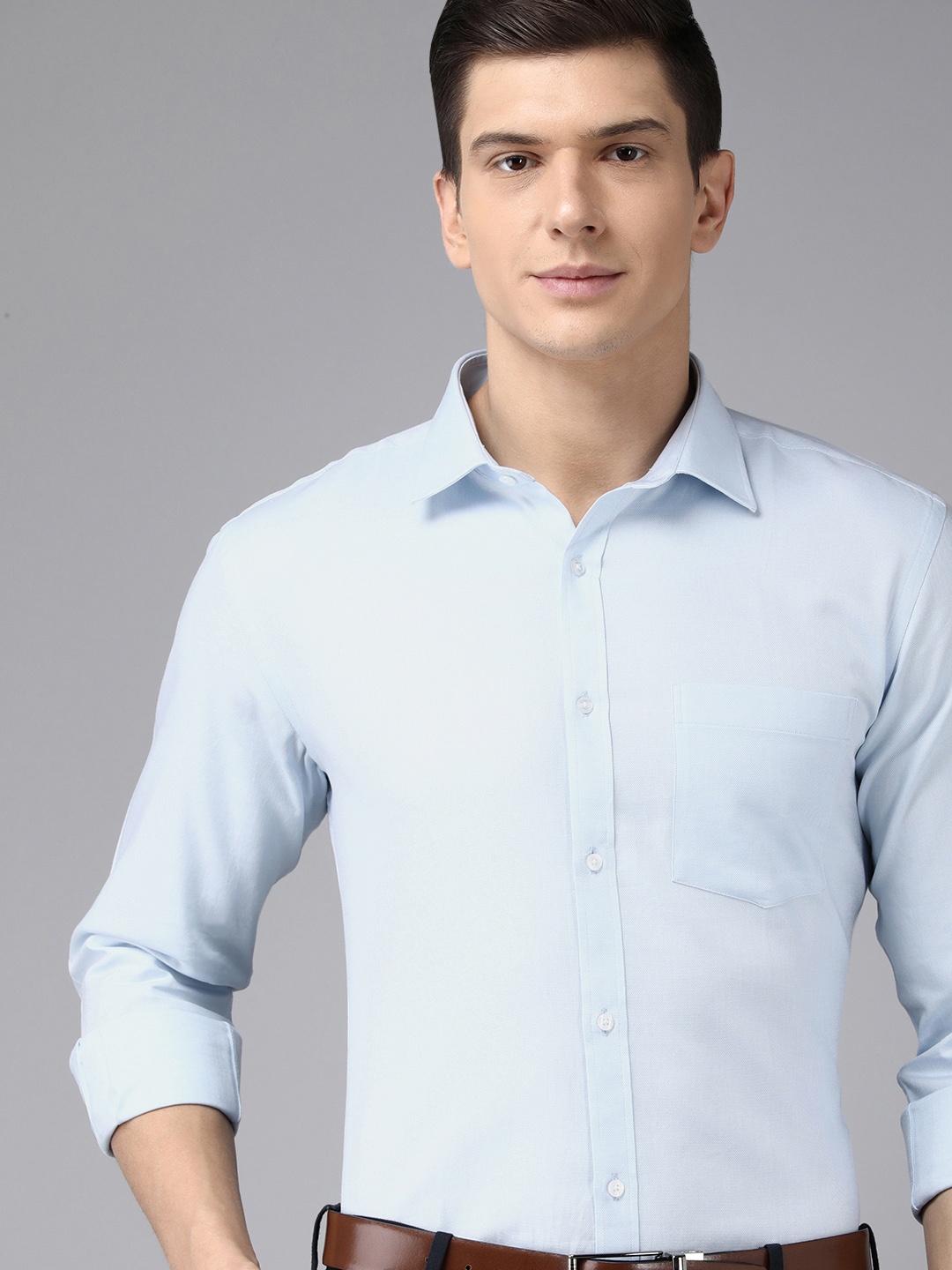 

Park Avenue Men Blue Solid Slim Fit Formal Shirt