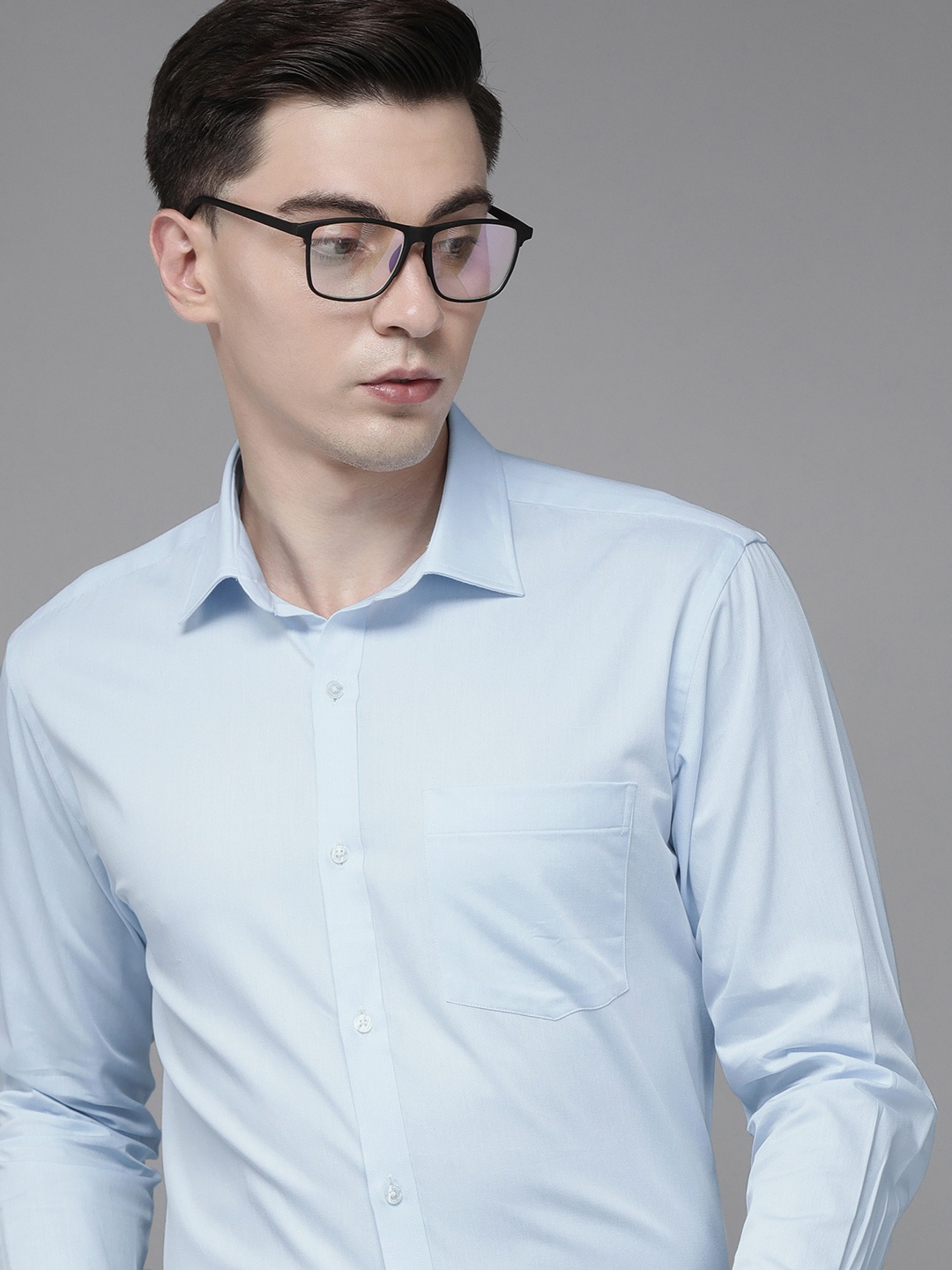 

Park Avenue Men Blue Solid Slim Fit Formal Shirt