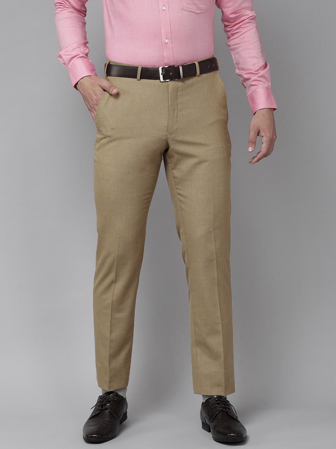 

Park Avenue Men Light Khaki Solid Mid Rise Formal Trousers