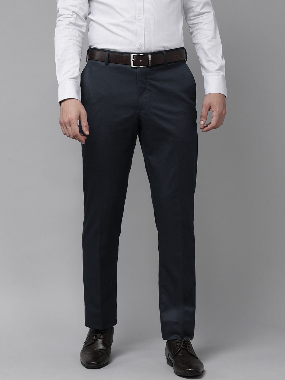

Park Avenue Men Dark Blue Solid Mid-Rise Formal Trousers