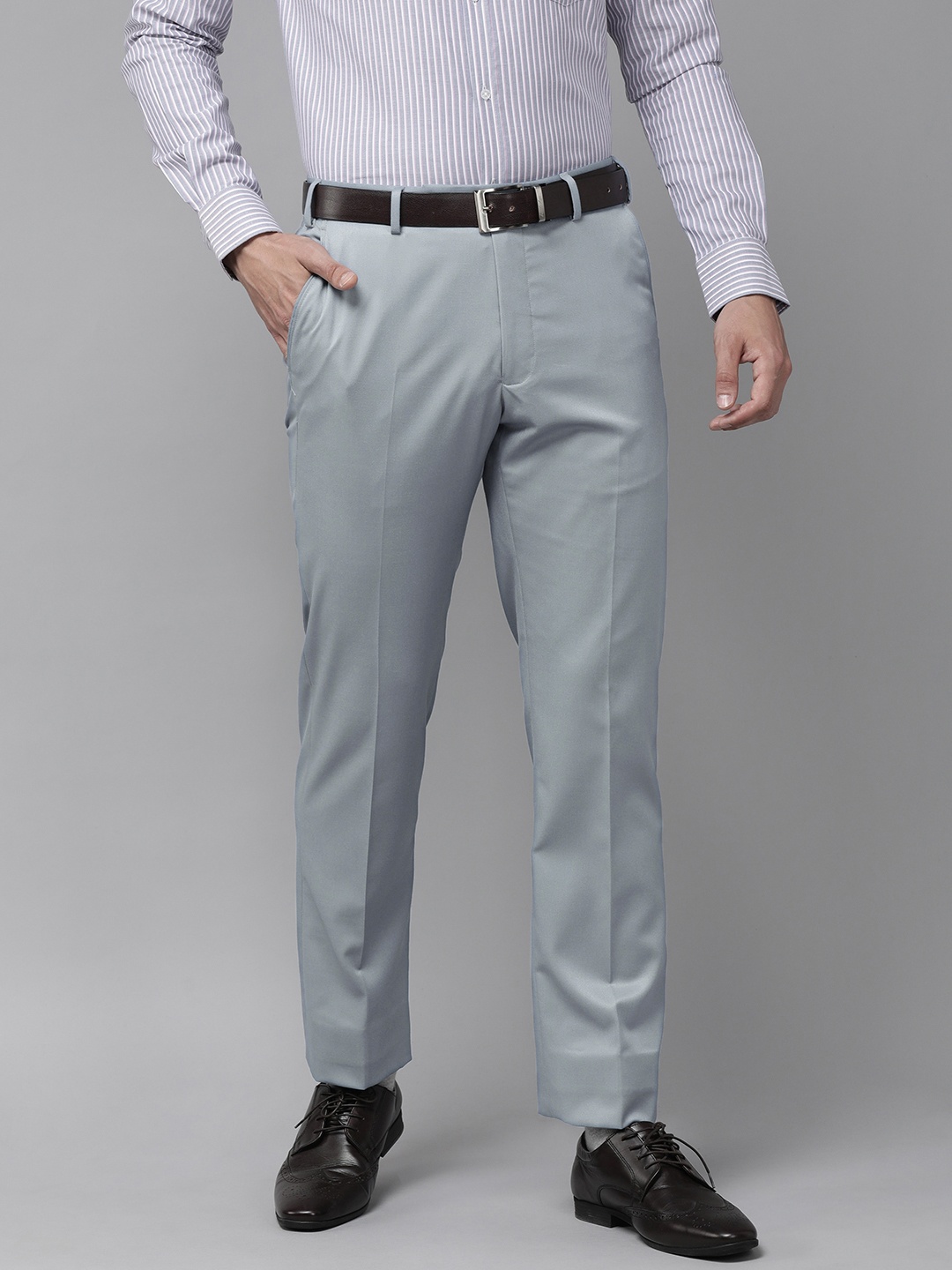 

Park Avenue Men Light Blue Solid Mid Rise Formal Trousers