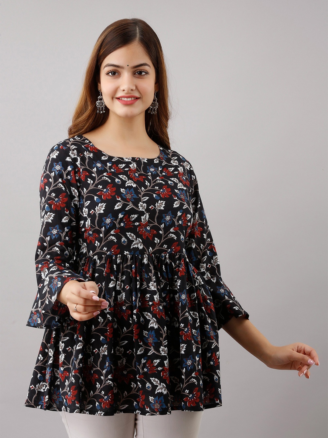 

Women Touch Black Floral Printed Empire Top