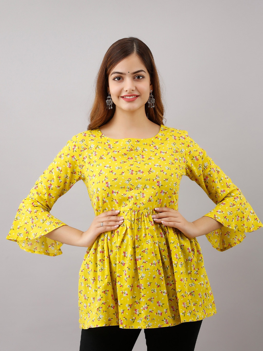 

Women Touch Yellow Floral Printed Empire Top