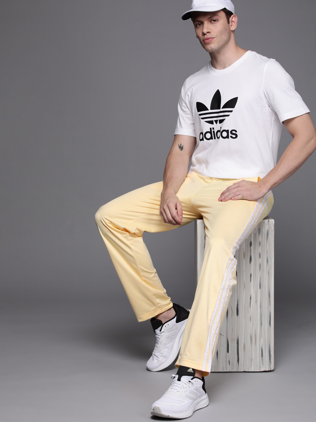 

ADIDAS Originals Men Yellow Solid Straight-Leg Side Striped Detail Track Pants