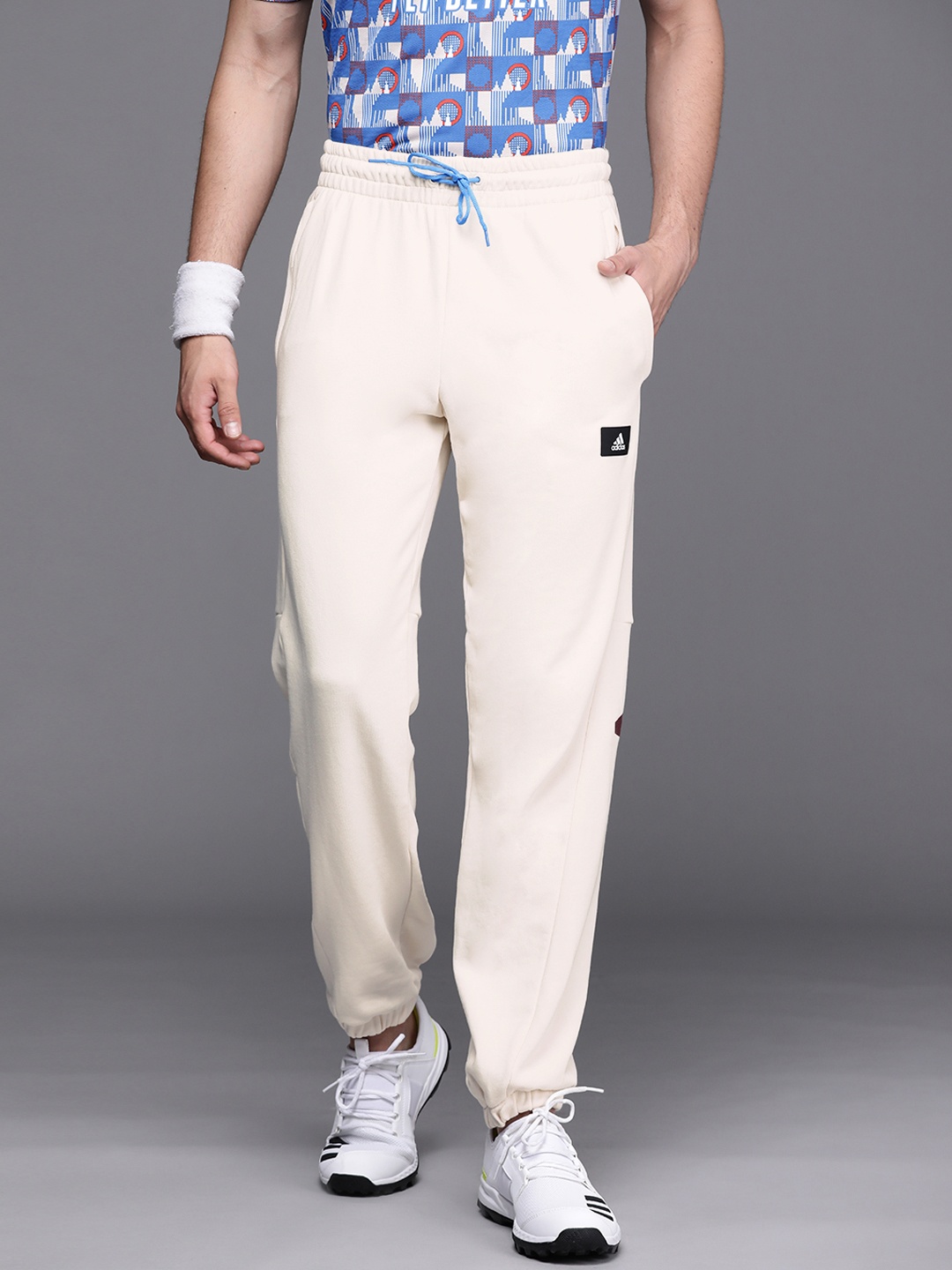 

ADIDAS Men Off-white Solid M Fi 3Bar Sustainable Joggers