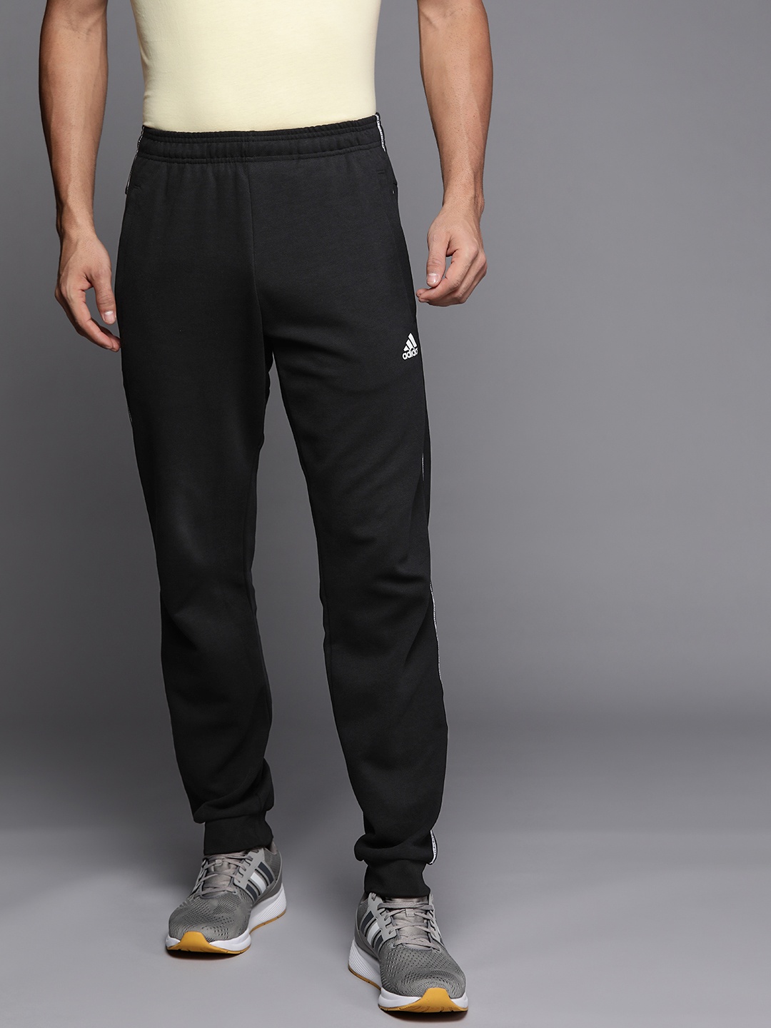 

ADIDAS Men Navy Blue C90 TP Solid Track Pants, Black