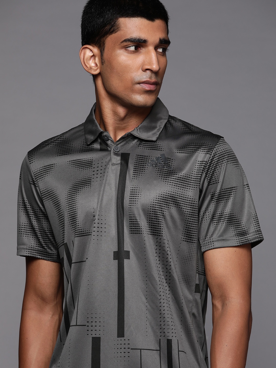 

ADIDAS Men Grey & Black Printed Club Graph Polo T-shirt