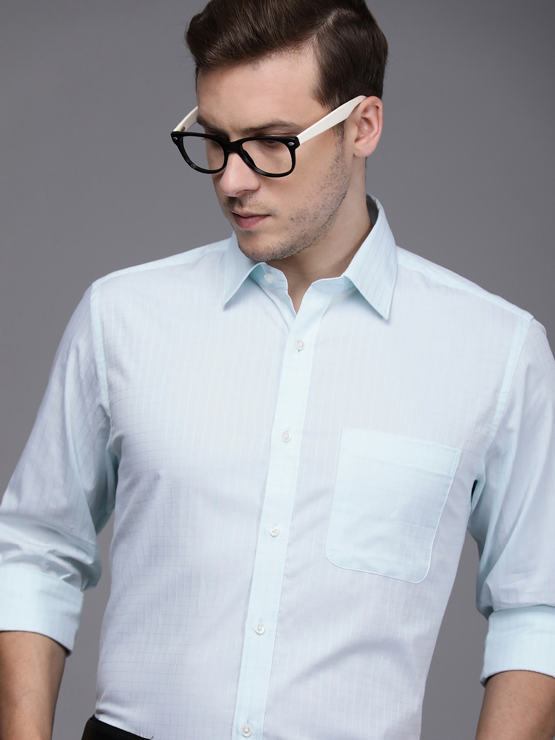 

Raymond Men Light Blue Slim Fit Self Design Pure Cotton Formal Shirt
