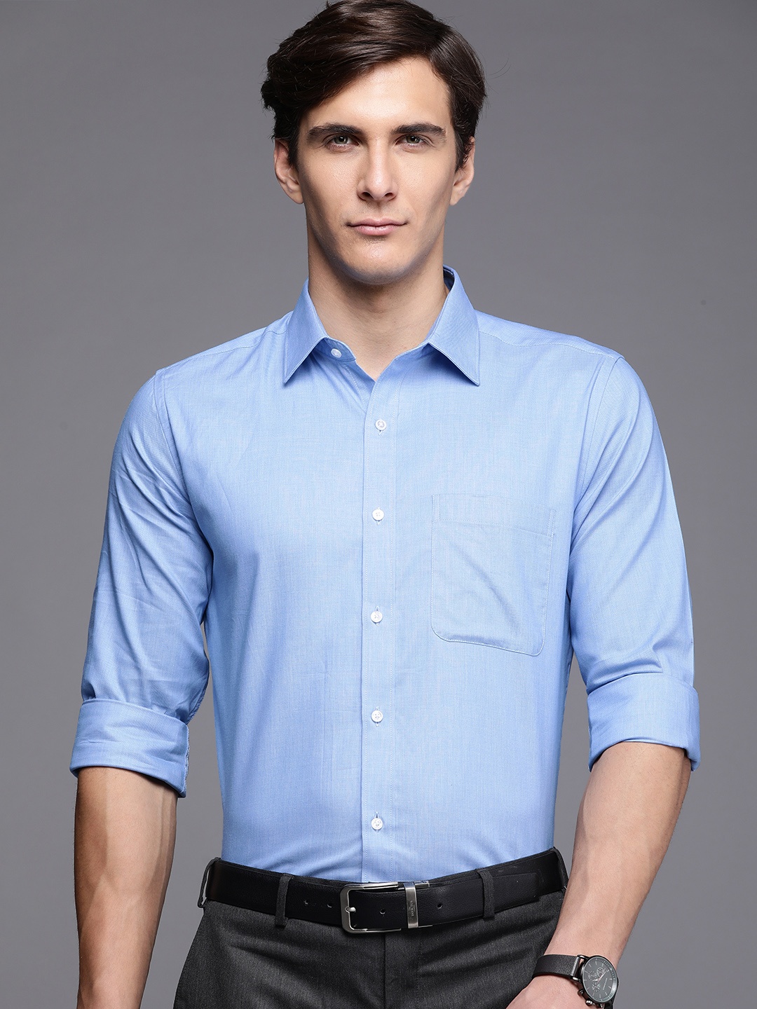 

Raymond Men Blue Solid Slim Fit Formal Shirt