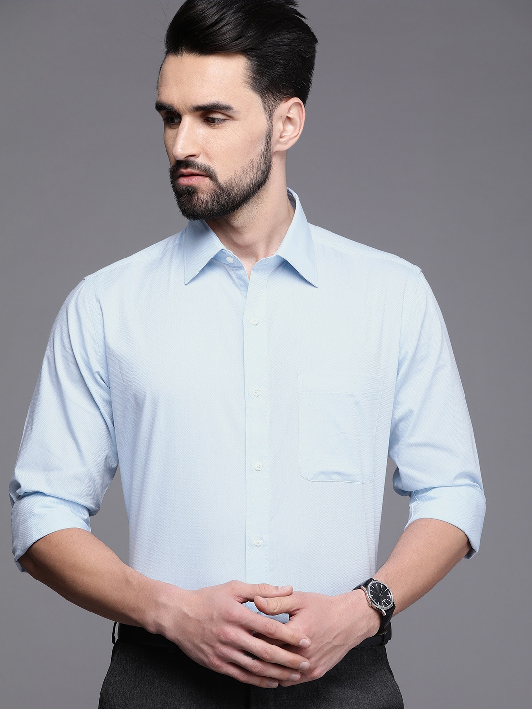 

Raymond Men Blue Textured Slim Fit Formal Shirt