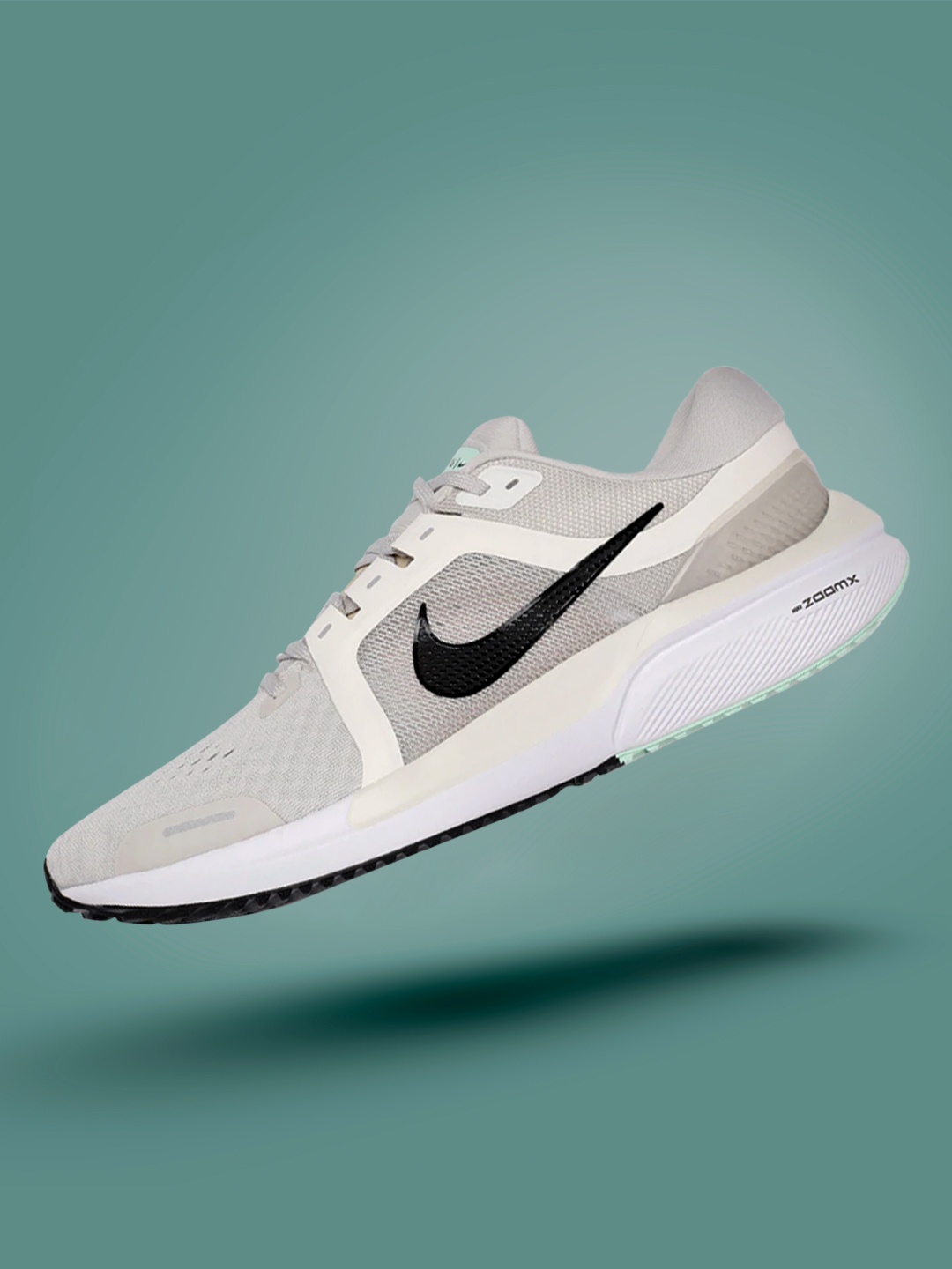 

Nike Men Beige Air Zoom Vomero 16 Road Running Shoes