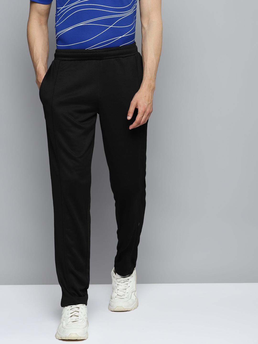 

Alcis Men Black Solid Slim Fit Mid-Rise Regular Track Pants