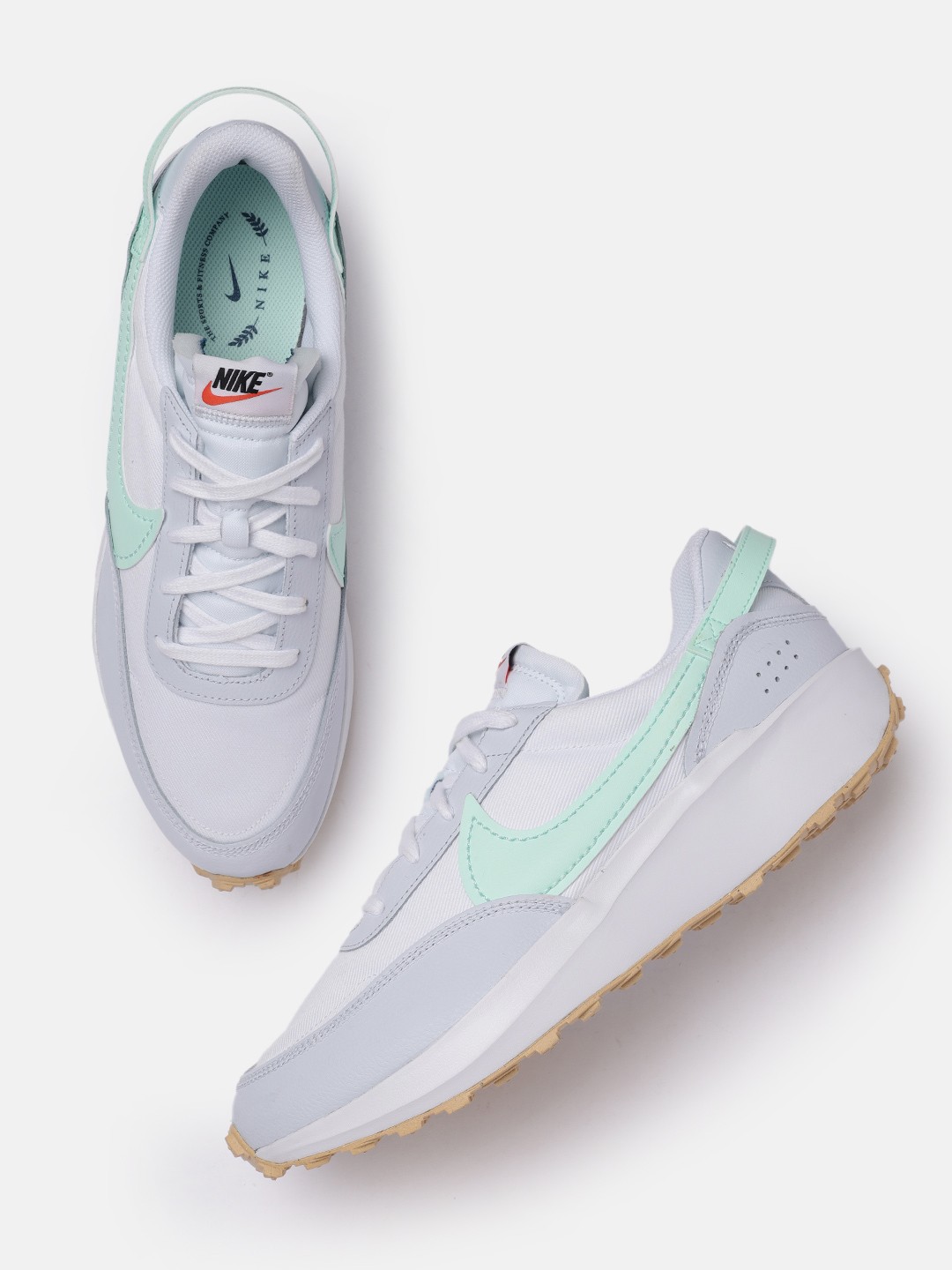 

Nike Women White & Sea green Colourblocked WAFFLE DEBUT Leather Sneakers