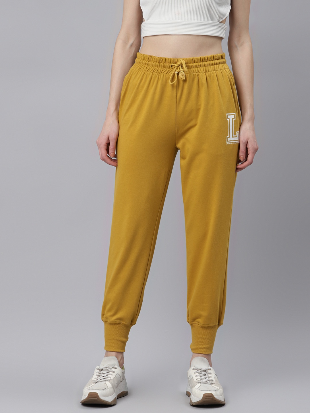 

Laabha Women Mustard Yellow & White Brand Logo Print Joggers