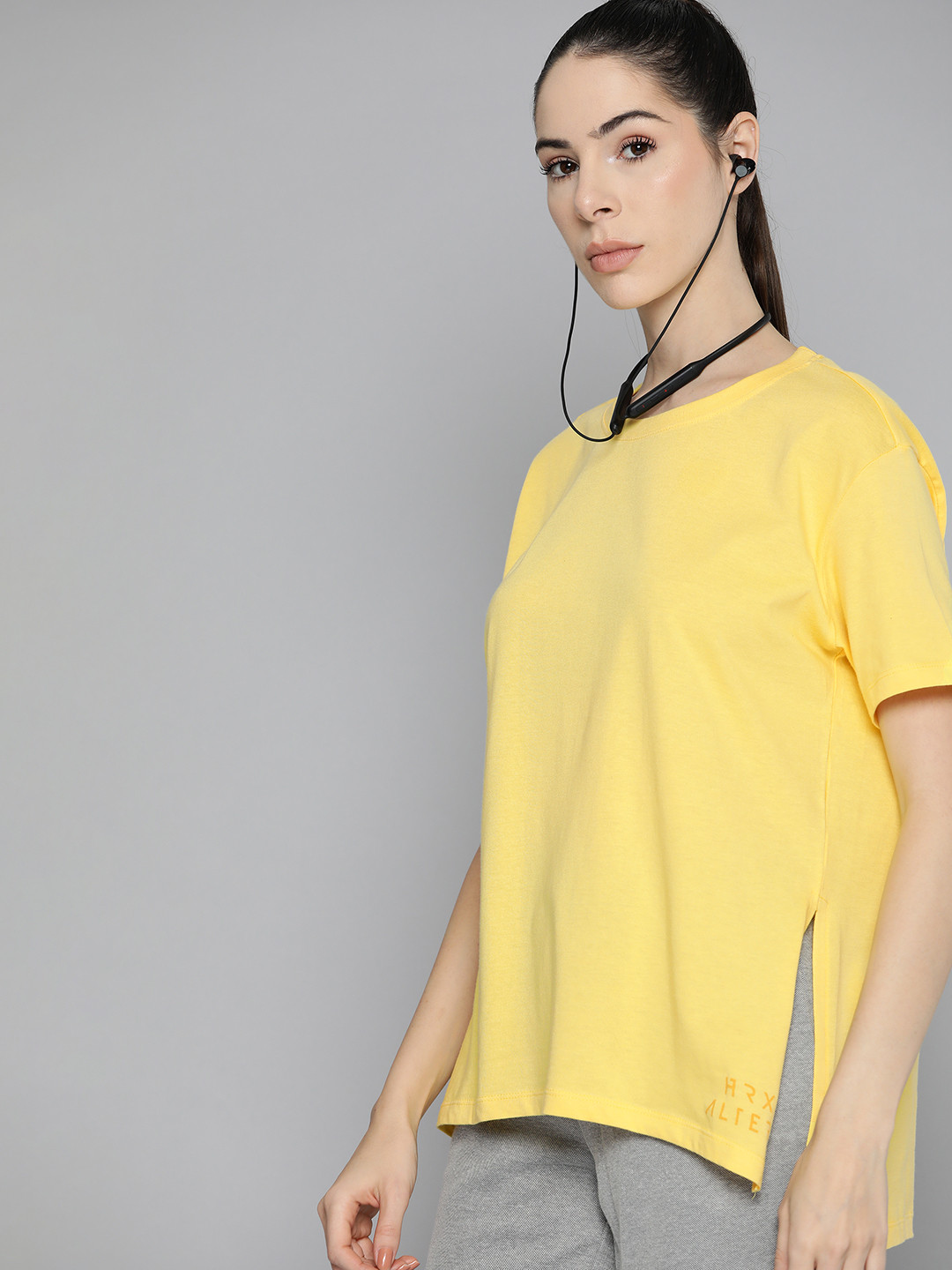 

HRX by Hrithik Roshan Women Yellow Solid Pure Cotton T-shirt