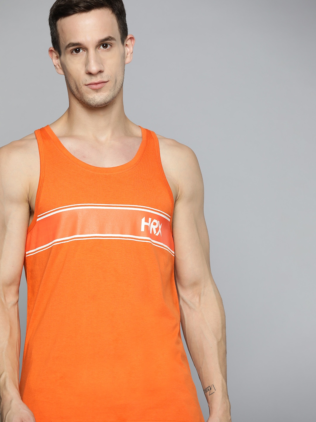 

HRX By Hrithik Roshan Training Men Orange Bio-Wash Brand Carrier Tshirts