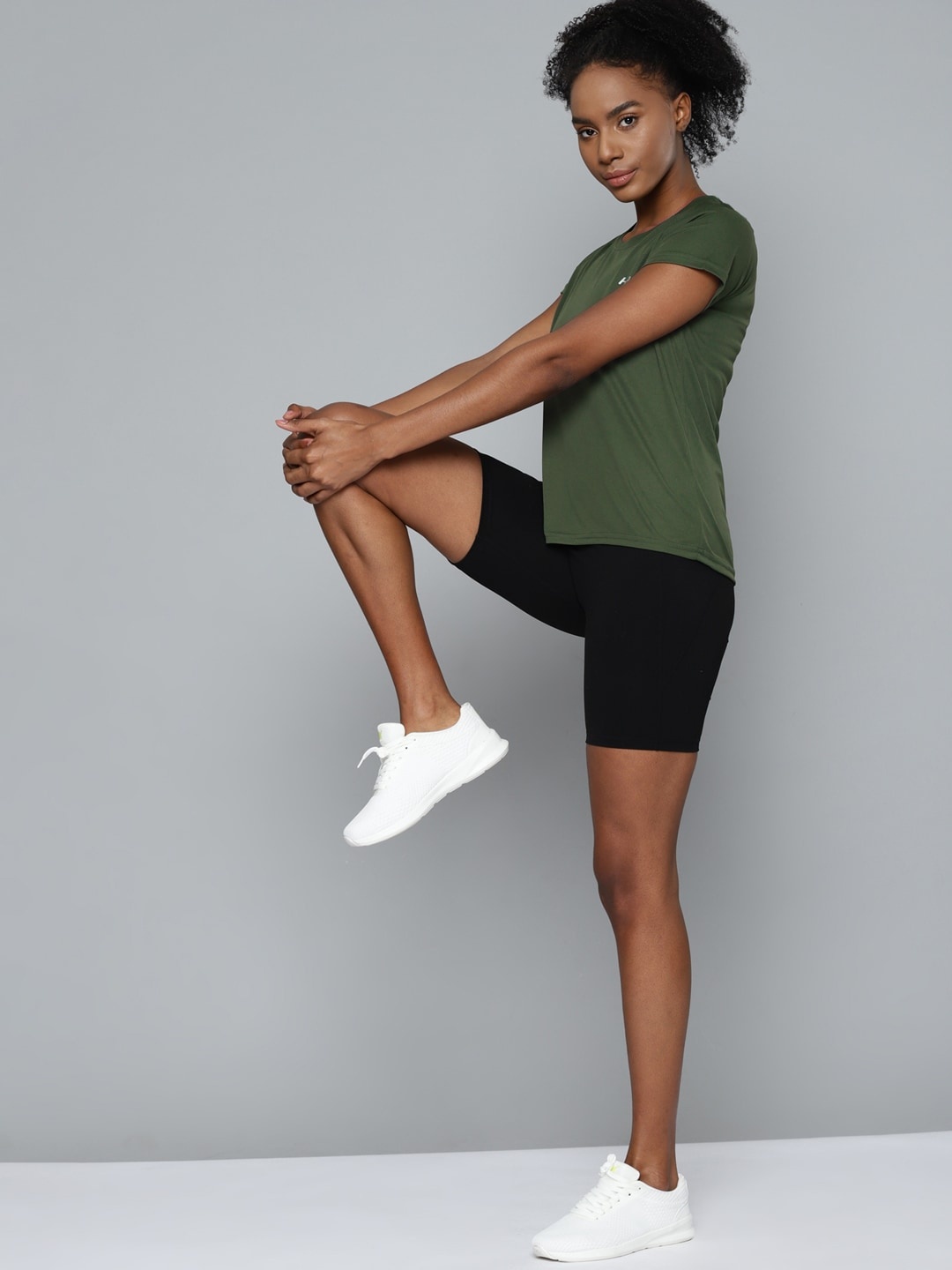 

HRX By Hrithik Roshan Training Women Kombu Green Rapid-Dry Solid Tshirt, Olive